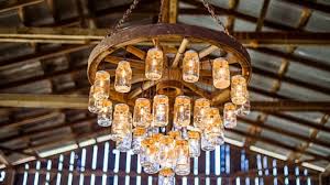 Wagon Wheel Chandelier Made With Mason Jars