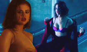 Selena Gomez stuns in silk bra and wet hair for Wolves vid | Daily Mail  Online