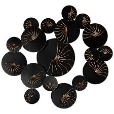 Black Discs With Gold Designs Wall Art