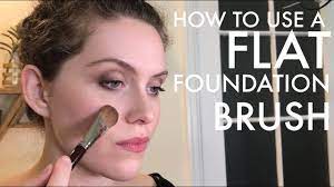 Then, tap off the excess product and apply it all over your face using a buffing, swirling motion. How To Apply Foundation With A Flat Foundation Brush Youtube