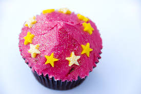 Royalty-Free photo: Pink star coated cupcake | PickPik