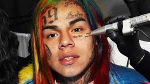 The colorful rapper debuts even more tattoos on his forehead and the sides of his face. Removing 6ix9ine S Face Tattoos Youtube