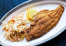 Stir together 1/3 cup yellow cornmeal and 1 tablespoon paprika in a shallow dish. Fried Catfish Recipe
