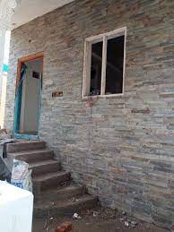 natural stone house front elevation
