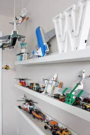 The sliding shelves in this diy lego display solution are awesome for creating little scenes and then safely sliding them away. Diy Lego Display Shelf Lego Display Lego Display Shelf Display Shelves