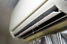 air conditioner spitting water