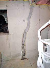 basement floor wall repair in
