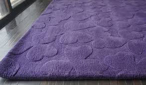 low texture hand tufted area rug