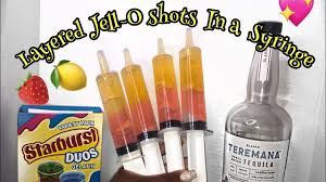layered jell o shots in a syringe kayy