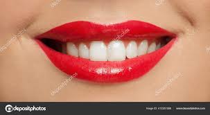 toothy smile white teeth red lipstick