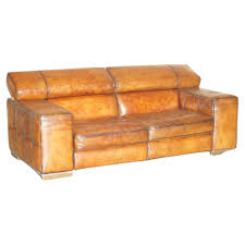 brown leather sofa raising headrest