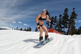 Bikini-clad babe falls while snowboarding in viral video