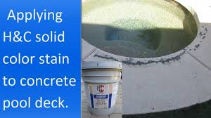 Applying H C Colortop Solid Color Stain To A Concrete Pool Deck