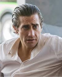 Jake gyllenhaal's Slicked-Back Style with a Clean-Shaven Look