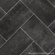 dark grey herringbone tile style vinyl