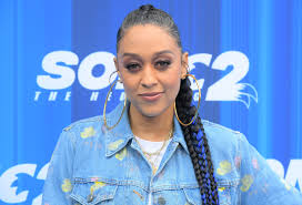 why tia mowry won t cover her grays at 44
