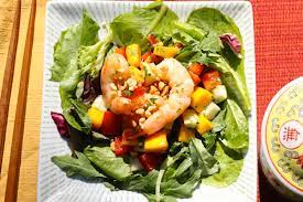 In a medium bowl, whisk together the lime juice and sugar until the sugar is completely dissolved, then add the fish sauce. Thai Mango And Prawn Salad Katiechin