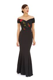 Fishtail dresses own longer hems in the back than in the front. The Pretty Dress Company Embroidered Bodice Fishtail Gown