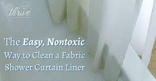 clean a fabric shower curtain liner