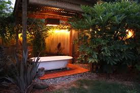It includes a poured concrete japanese soaking tub, concrete countertops and a 9 1/2 foot tall tile mosaic shower wall. 9 Diy Outdoor Hot Tubs You Can Build Yourself Shelterness