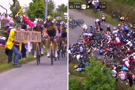 The tour de france will be filing a lawsuit against the spectator who caused a massive pileup when she stepped onto the road in the first stage of the race on saturday. Vu3eqvvezuzim