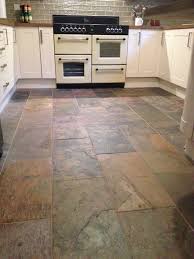 Polished marble is still very popular providing that sense of glamour and opulence and tumbled marble gives you that aged appearance. Our Sheera 600x300mm Natural Stone Tiles Look Wonderful In This Kitchen Design The Autumnal Colour Stone Kitchen Floor Slate Floor Kitchen Stone Tiles Kitchen