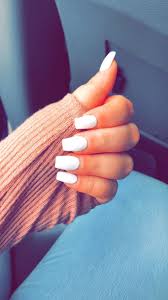 Short coffin nails are all the rage when you want elegant nails without the extra length. White Coffin Nails White Coffin Nails Coffin Shape Nails Summer Acrylic Nails