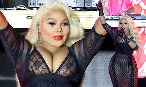 Lil' Kim puts on very eye-popping display as she performs braless in sheer  Gucci dress | Daily Mail Online