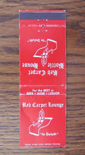 flying carpet matchbook cover red