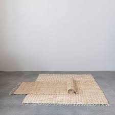 woven jute and cotton rug with fringe