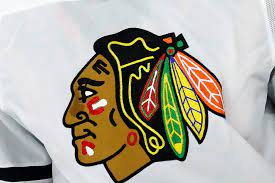 Blackhawks GM resigns, team fined after ...