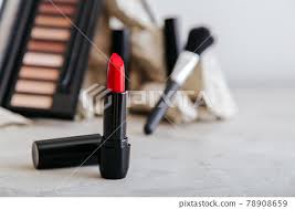 red scarlet lipstick and set of