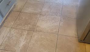 remove wax buildup from tile floors