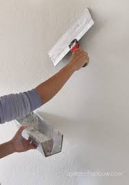 to skim coat smooth a textured wall