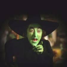 why do witches have green faces and fly