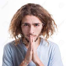Facial Expression And Emotions. Begging Man Praying, Holding Hands Clasped  Near Face On White Isolated Studio Background Stock Photo, Picture and  Royalty Free Image. Image 75867345.