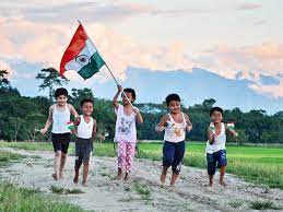 Village children hold Indian National flags - India celebrates 69th  Independence Day | The Economic Times