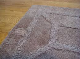 how to remove furniture dents from rugs