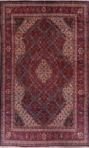 red sarouk area rug hand knotted living