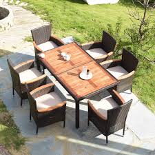 Plus, in addition to its functionality, outdoor dining furniture showcases your aesthetic. Amazon Com Tangkula 7 Pcs Outdoor Patio Dining Set Garden Dining Set W Acacia Wood Table Top Stackable Chairs With Soft Cushion Poly Wicker Dining Table And Chairs Set Brown Kitchen Dining