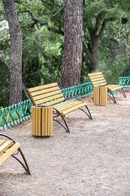 Yellow Wooden Park Benches And Rubbish