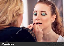 close view makeup artist applying
