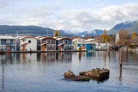 colourful floating houseboats line