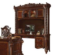 The three drawers are of varying heights, so items of all sizes can fit and the small fixed shelf under the work surface can hold your laptop when you're not using it. Vendome Ornate Traditional Computer Desk Hutch In Brown Cherry