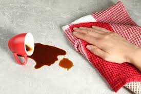 spilled coffee on carpet stock photo by