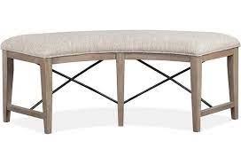 A dining table with benches provides for versatile seating since you can remove the furniture to another room and increase the seating space. Magnussen Home Paxton Place Curved Dining Bench With Upholstered Seat Value City Furniture Dining Benches