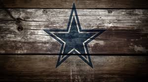 an image of the dallas cowboys crest on