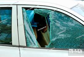 Car Window Smashed By A Thief Stock