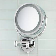 magnifying mirror at linen chest
