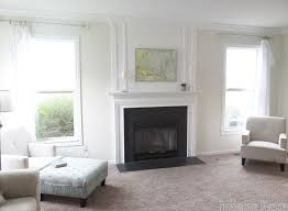 wood trim above fireplace mantle